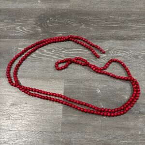 Red beaded garland strand